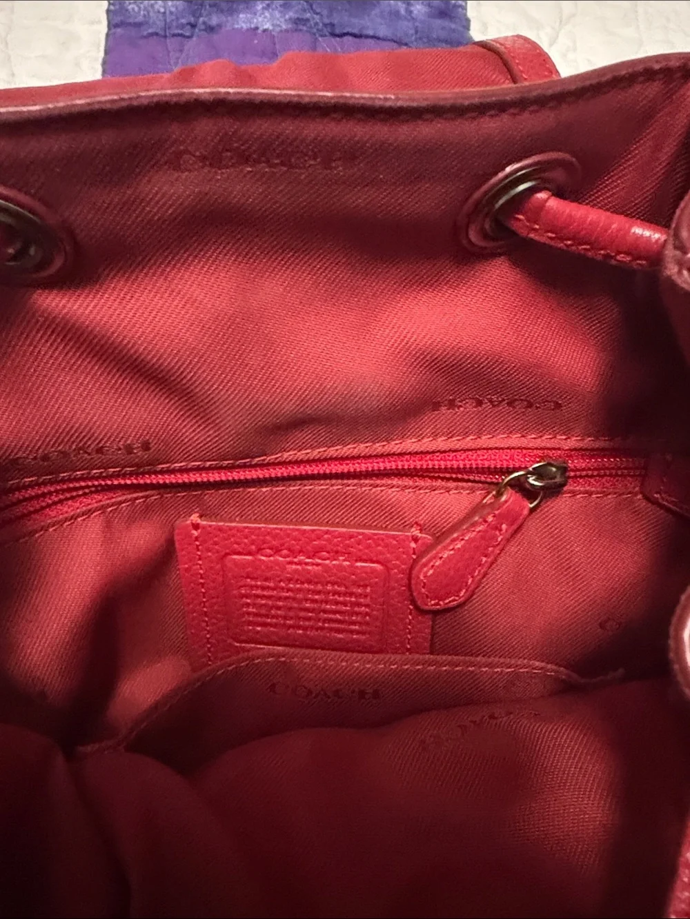 Coach compact pebbled